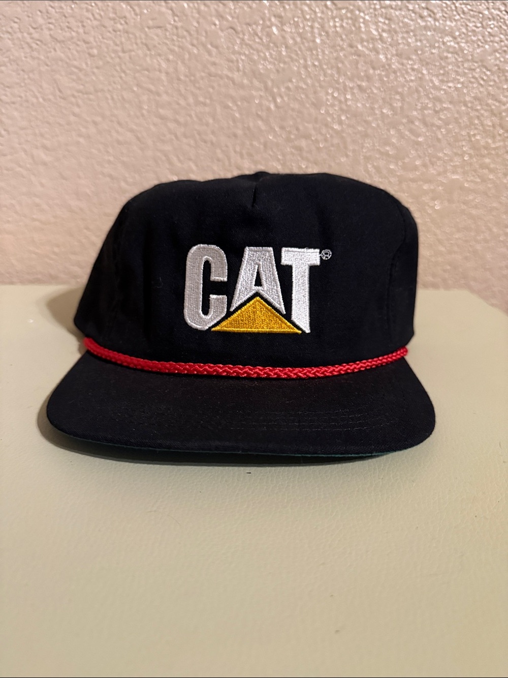 CAT Black Cap with Red Accent and Yellow Logo